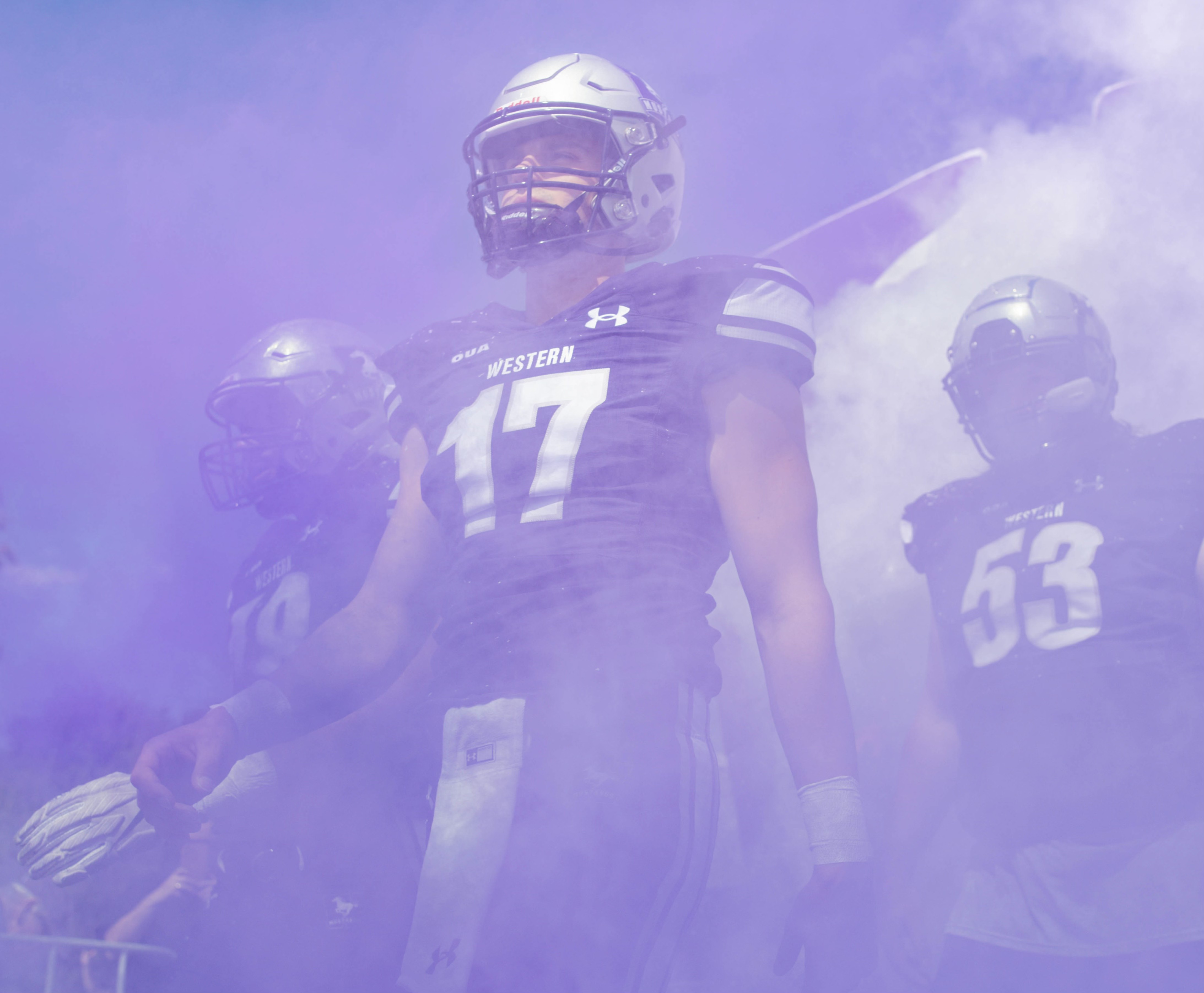 Matt playing football for Western University